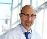 headshot of mptc physician dr. william regine