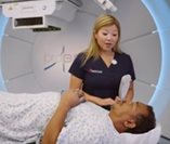 radiation therapist treating proton therapy patient